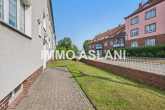 Außenansicht - Gepflegtes MFH mit 8 Einheiten, PV-Anlage & Ausbaureserve in gefragter Wohnlage