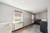 Wohnbereich_4 - Außergewöhnlich vielseitiges Wohnhaus mit Kamin, Einbauküche und großem Hofbereich