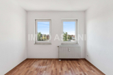 Wohnzimmer - Wohnen auf zwei Ebenen – bezugsfreie 3-Zimmer-Maisonette mit Balkon in Leipzig-Ost