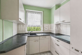 Küche_1 - Charmante 2-Zimmer-Eigentumswohnung mit Terrasse und kleinem Garten in ruhiger Lage